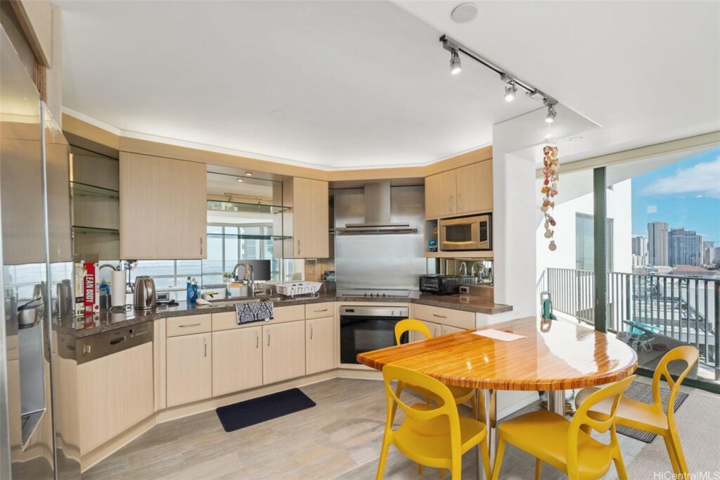 view of the kitchen and dining area at at a condo in Honolulu